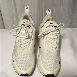 Nike Air 27C White Sneaker.        Size 10. Excellent preowned condition.